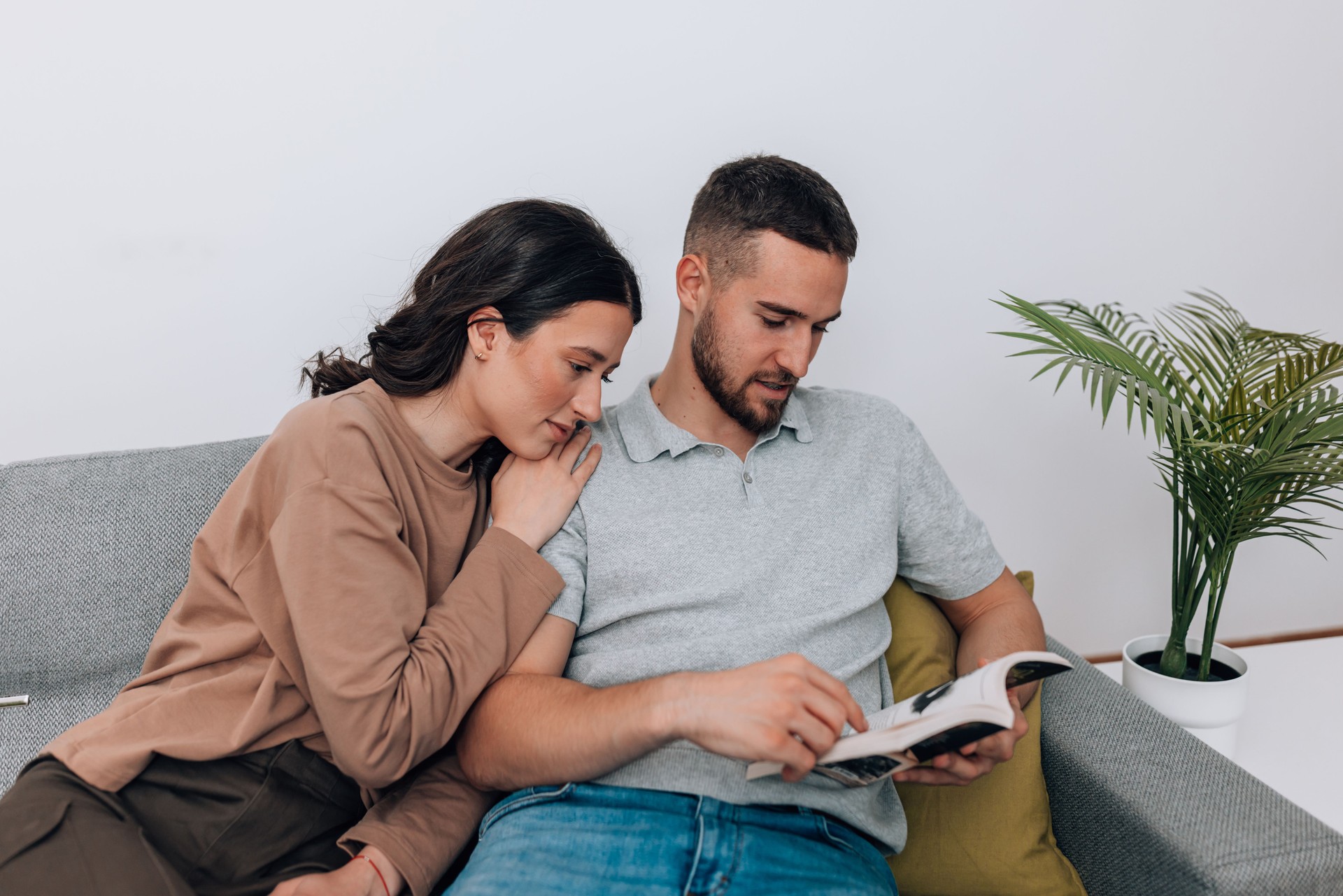 Young couple reading together