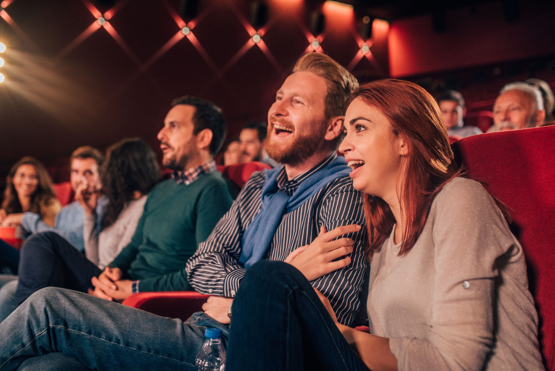 Couple hugging at cinema